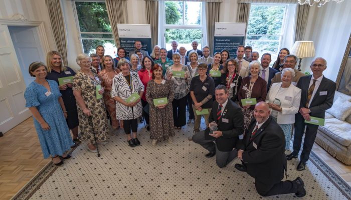 Charity representatives welcomed to Government House to receive their grants.